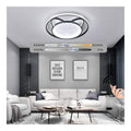 Solution lumineuse Noir et Ambre au dessin sobre en format spot de plafond