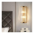 Luminaire Dore et Ambre a silhouette graphique de type applique murale 40 W